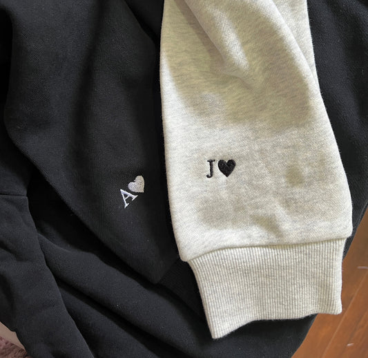 Couple hoodies with initials and heart embroidered on sleeves