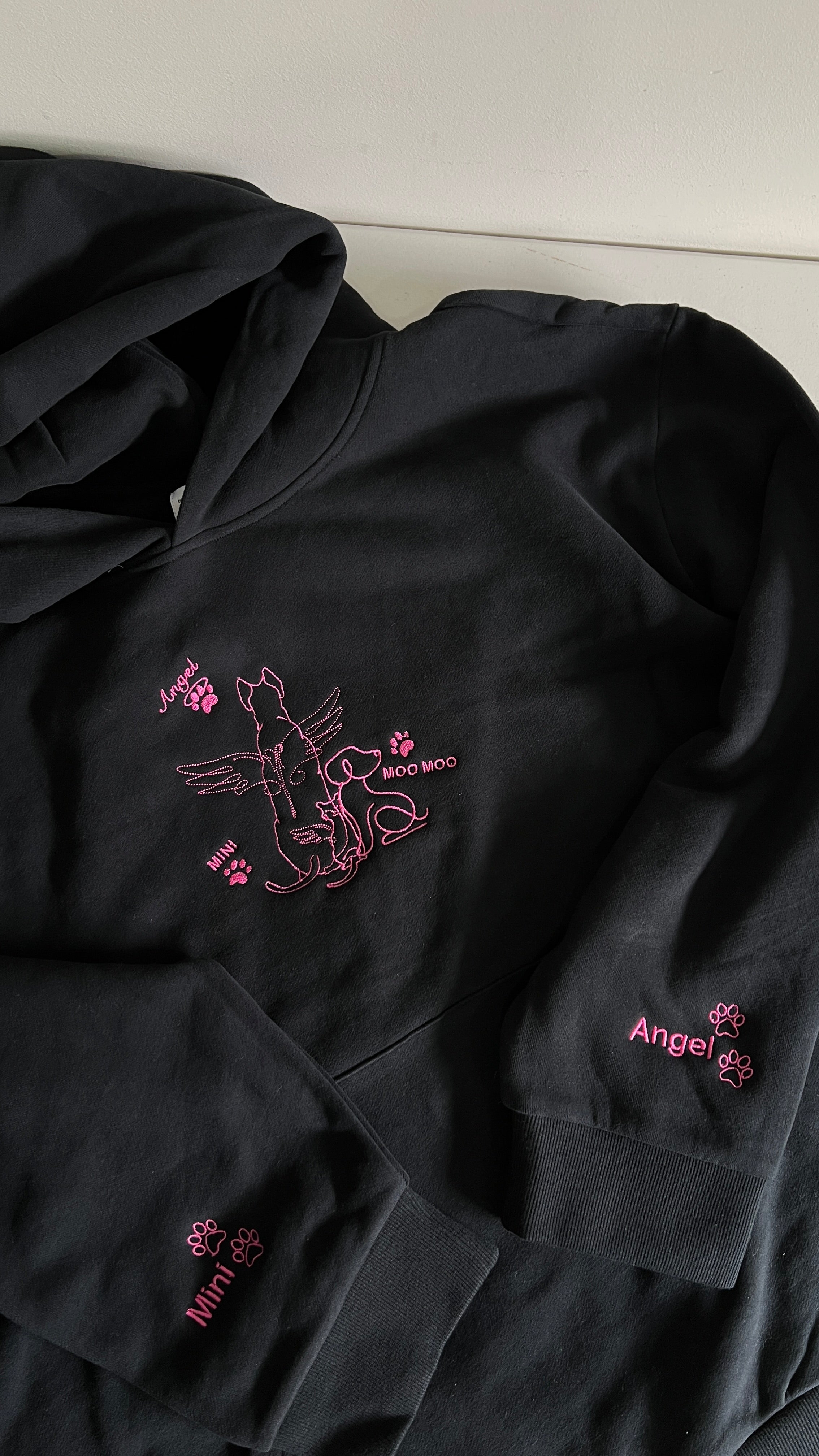 Photos of cat and dog embroidered on a heavyweight jumper Australia