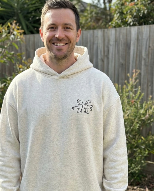 Embroidery detail — children's artwork stitched onto premium cotton hoodie, made in Melbourne