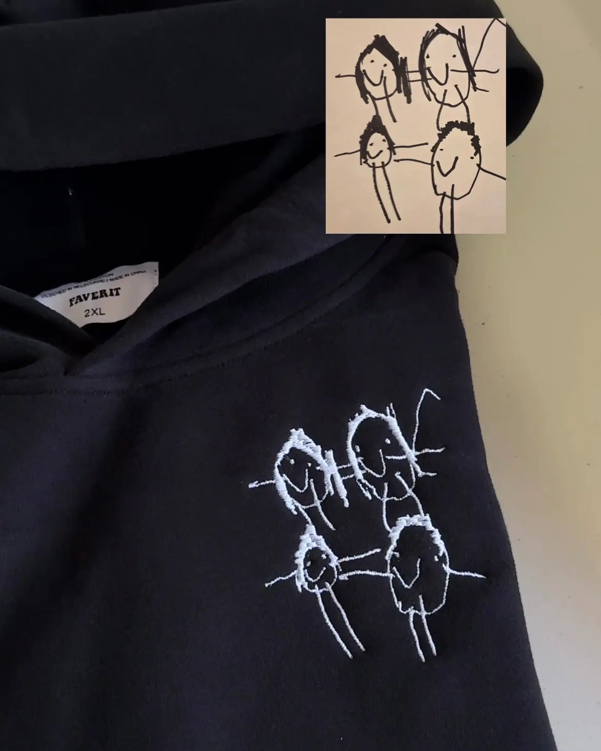 Custom embroidery on a hoodie from a kid's drawing for gifting to mum or dad