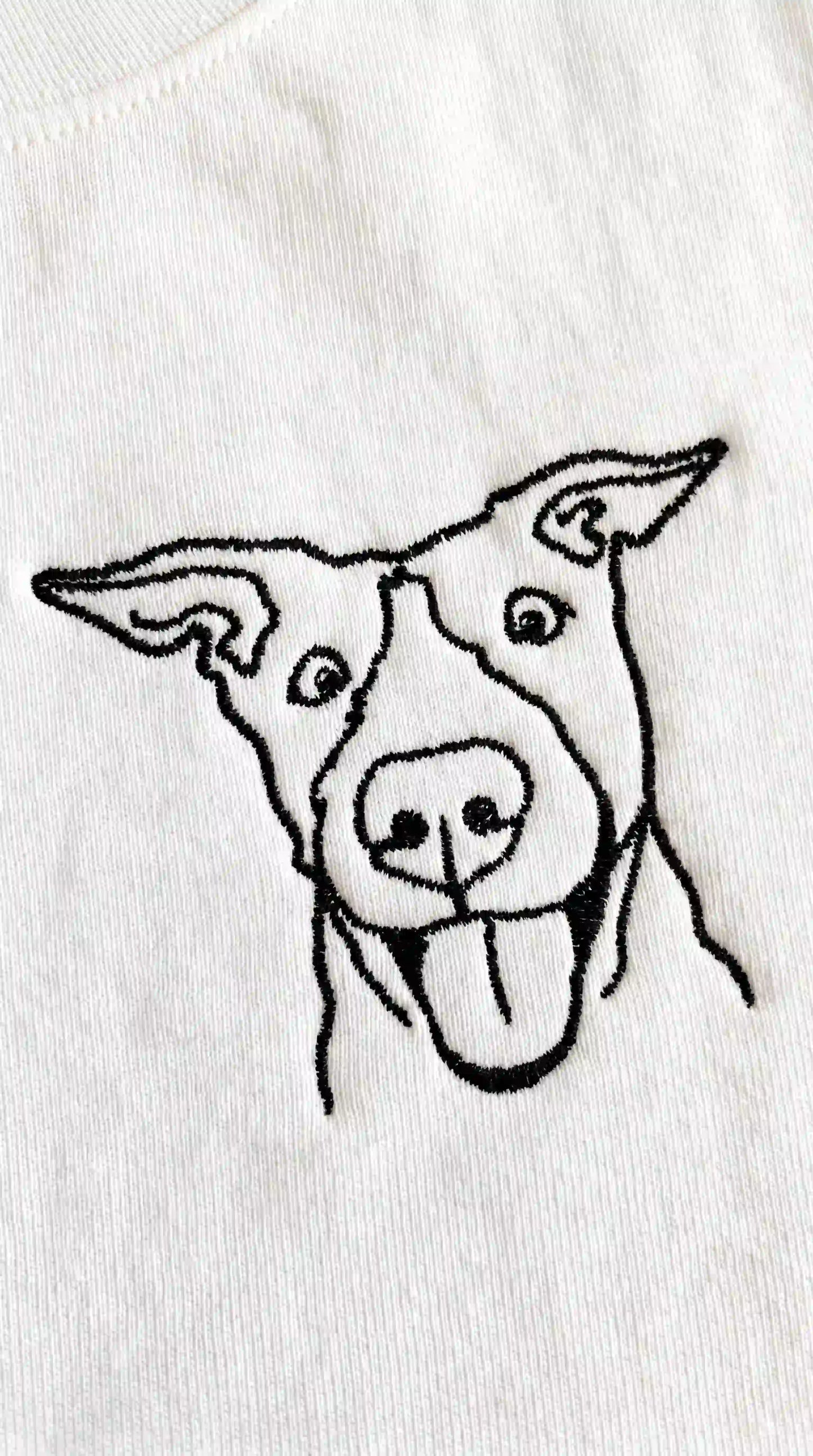 Close-up of dog portrait embroidered on oversized tshirt — custom pet shirt Australia, Melbourne made