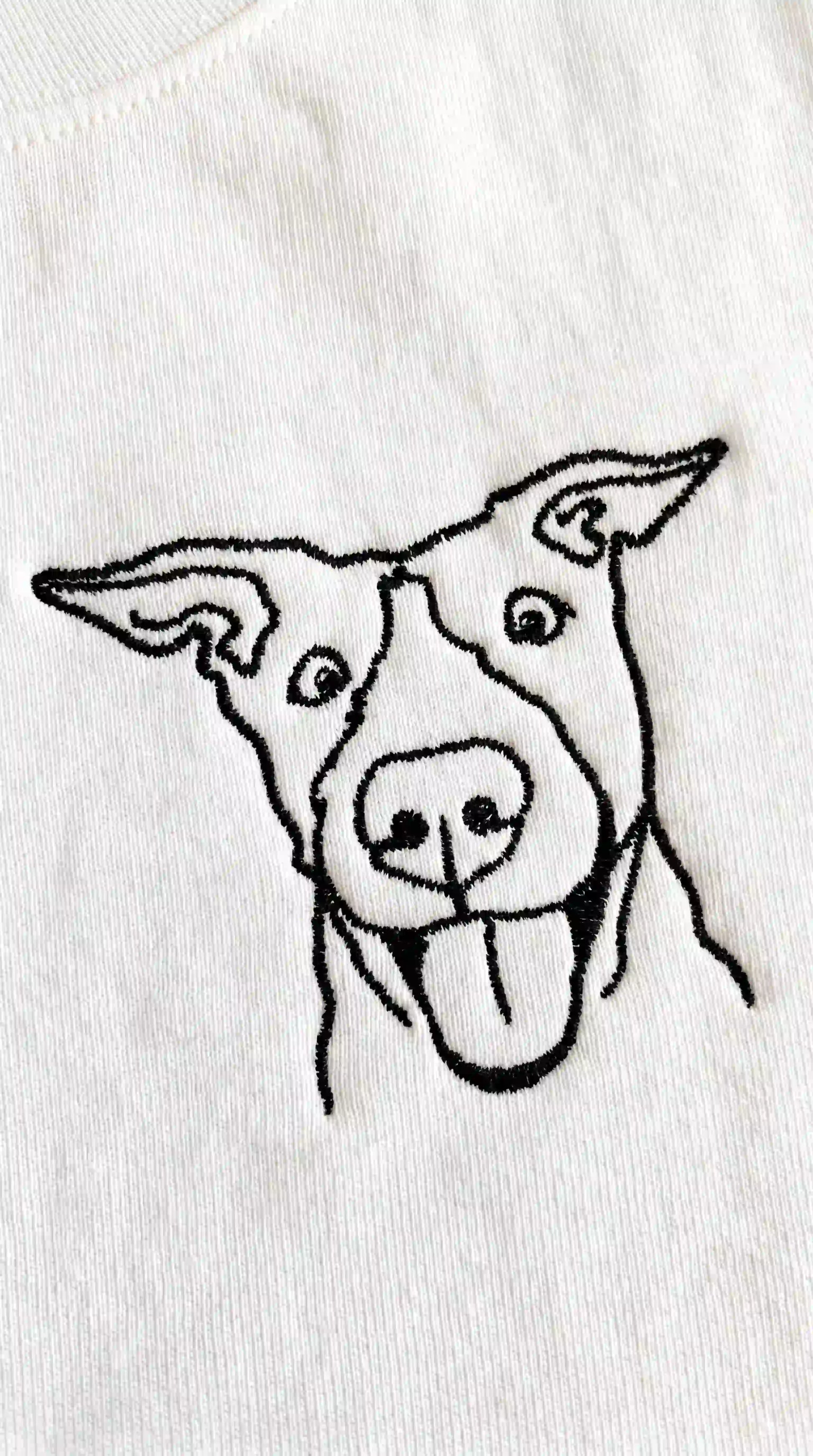Close-up of dog portrait embroidered on oversized tshirt — custom pet shirt Australia, Melbourne made