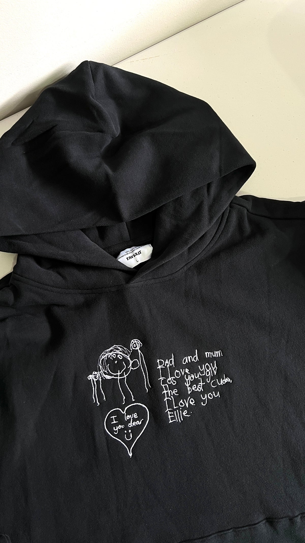 Kid’s drawing with their hand written note embroidered on a premium cotton jumper Melbourne