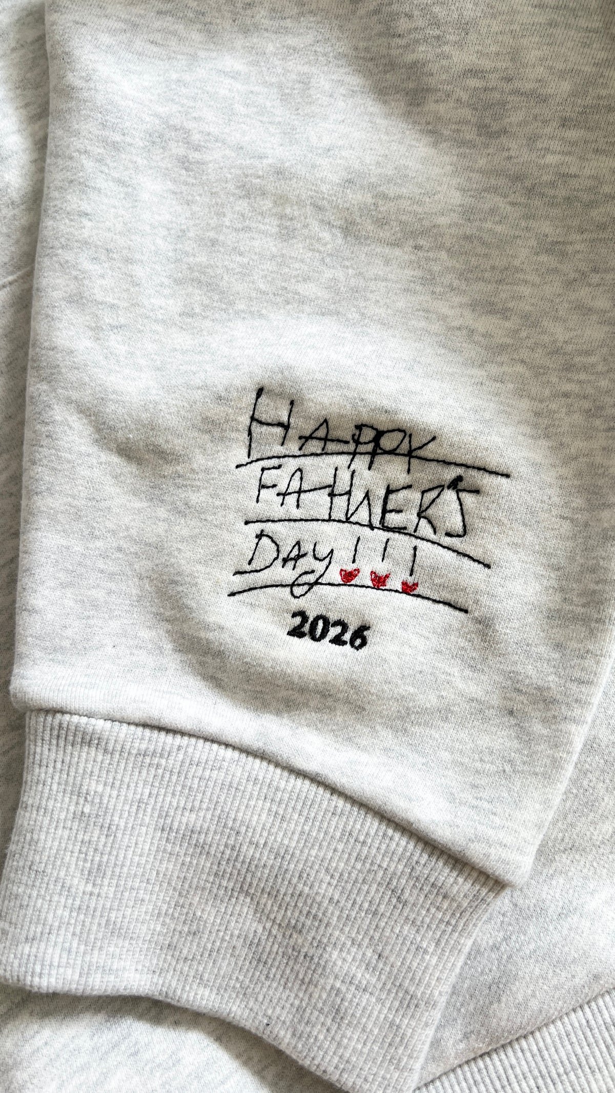 Kid’s handwriting embroidered on a heavyweight jumper for father’s day gift
