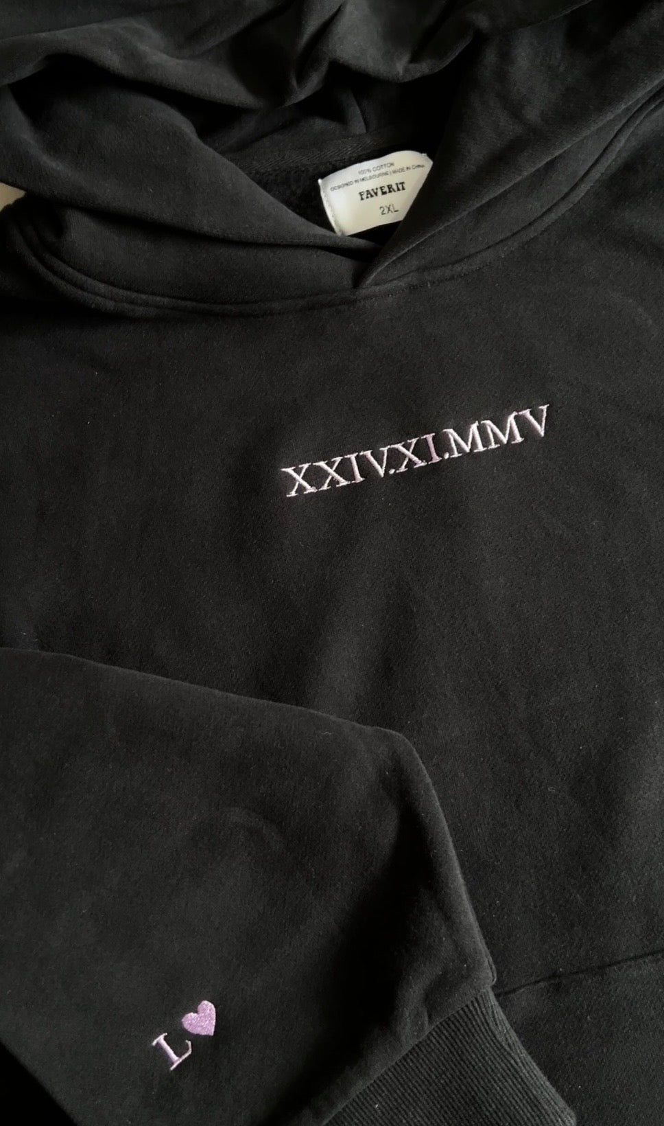 Centre chest embroidery of the birthday, anniversary or any special occasional date in roman numerals on a sweatshirt hoodie. A gift for partner on anniversary, valentines etc.