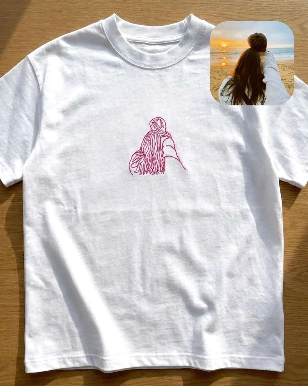 Couple portrait embroidery close-up — custom line art stitched on premium 275GSM cotton tshirt Australia