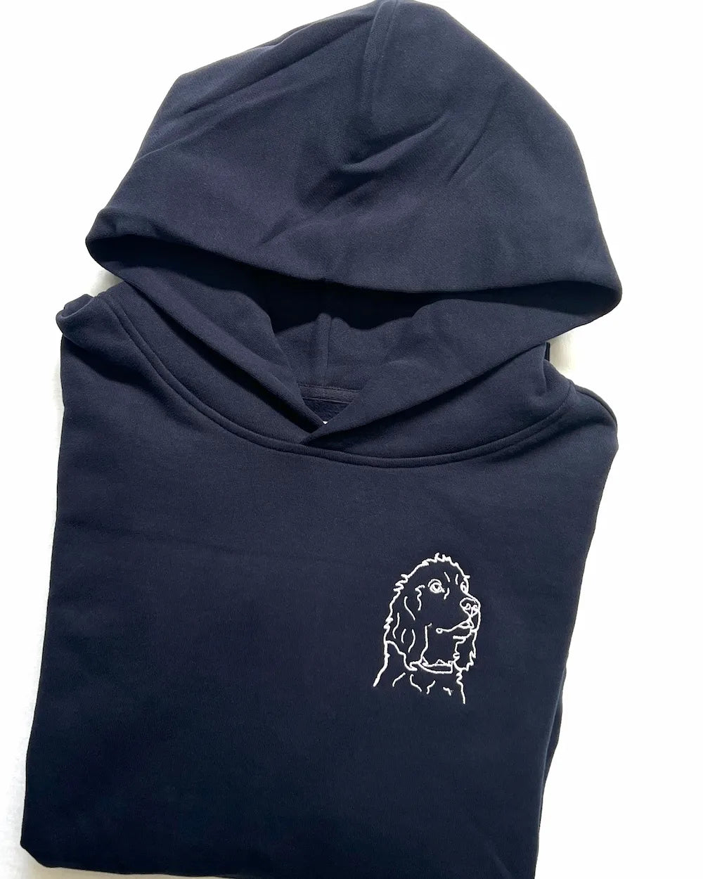 Custom pet embroidery hoodie Australia — personalised dog portrait line art on navy 380GSM cotton hoodie, embroidered in Melbourne