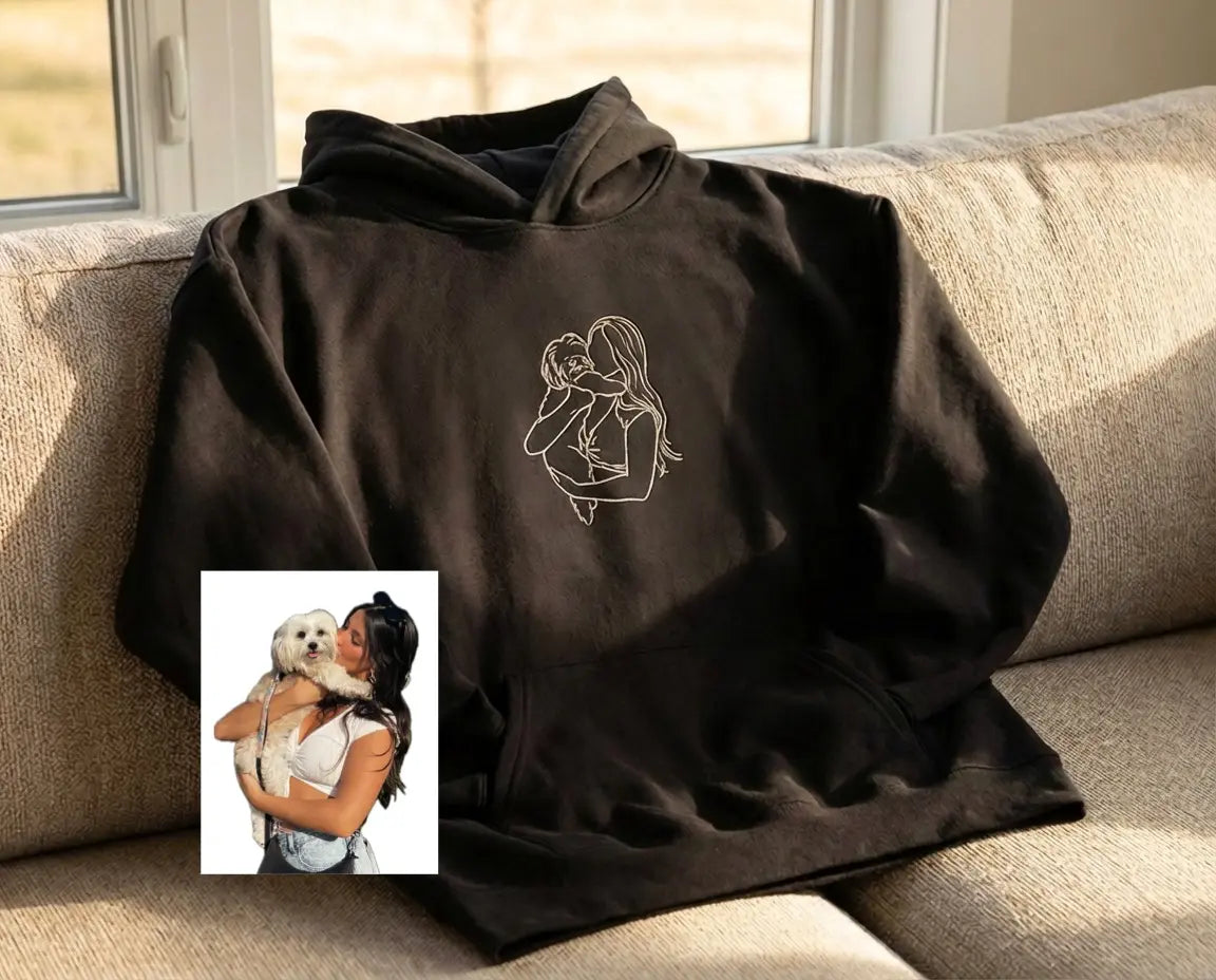 Dog owner with dog on a black custom dog jumper