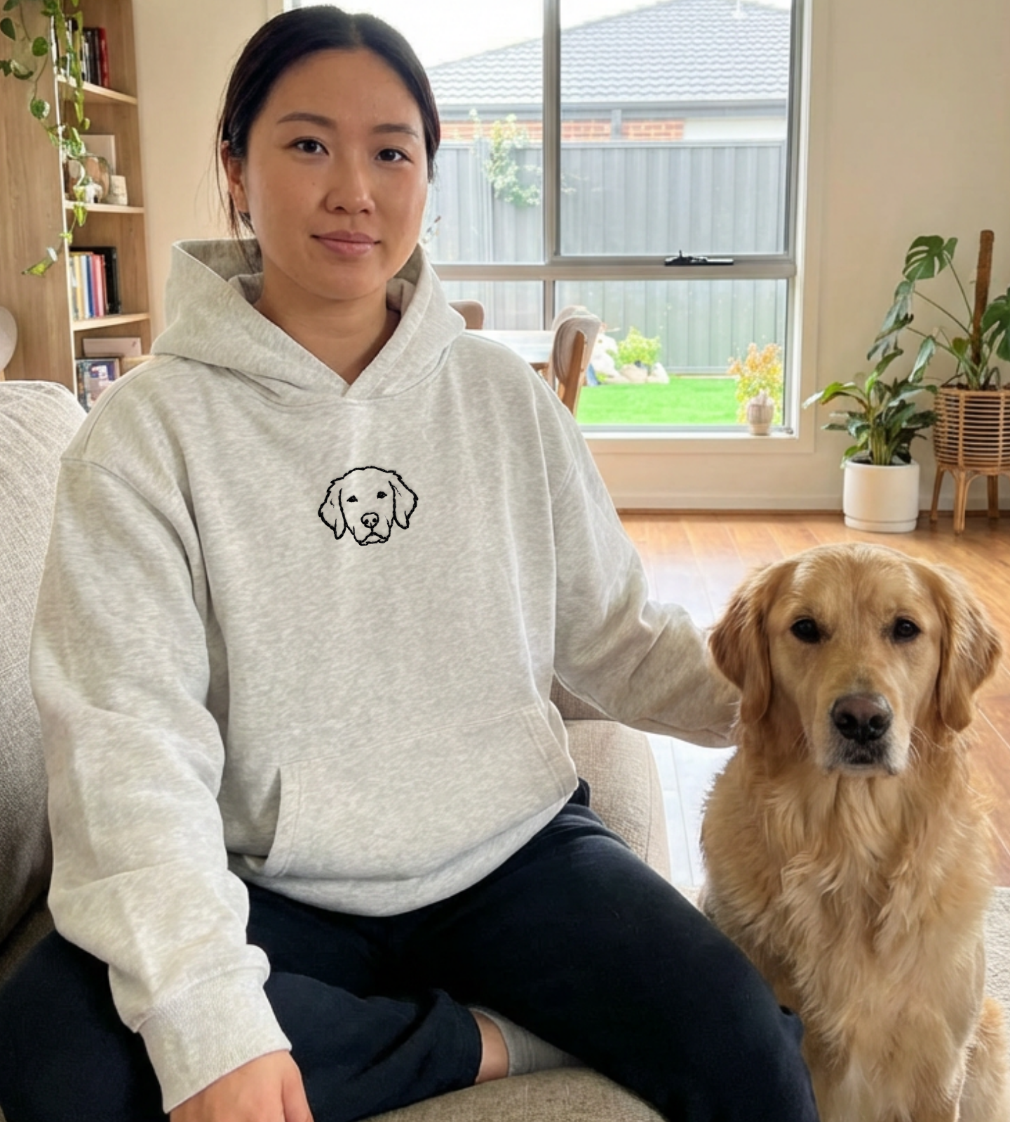 Custom pet hoodie with embroidered dog line art on premium cotton hoodie